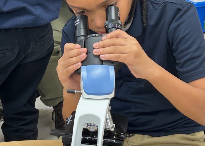 Northeast Girl With Microscope